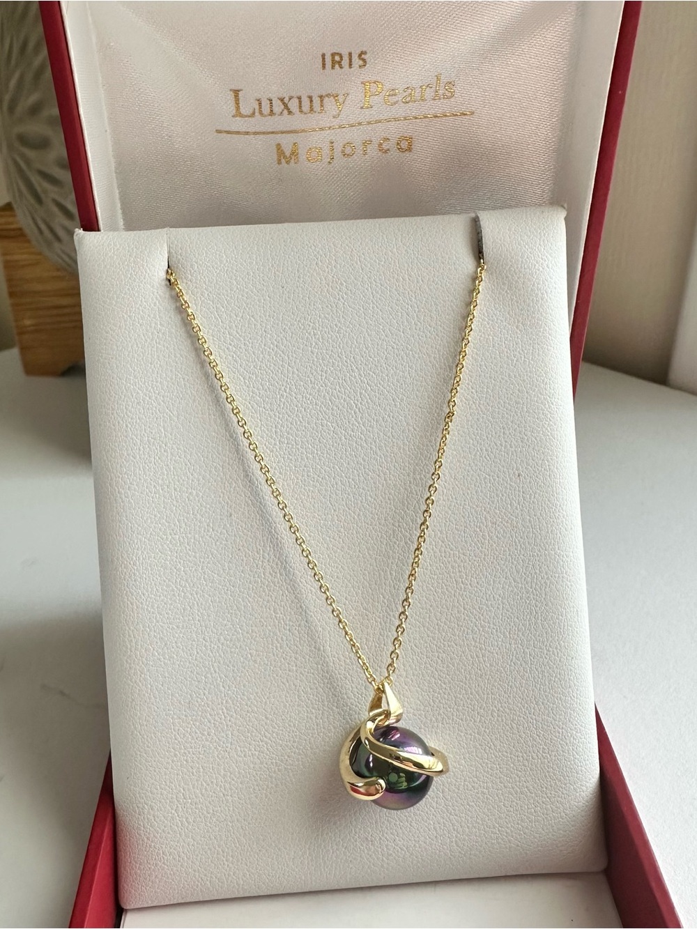 Gold Necklace with Iridescent Black Pearl Pendant